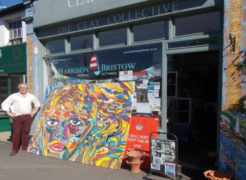BB Bango with his painting 'Eyes'  Painting by BB Bango in acrylic 8 ft by 6ft  on 4 canvasses. 800. On display Bembridge shop .This picture has been submitted to the Royal Academy Summer Exhibition 2015  but not shortlisted